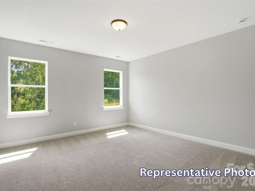 128 Swing Way, Troutman, NC 28166.  MLS# CAR4391618, YatesRealty ID 40277. Primary Bedroom