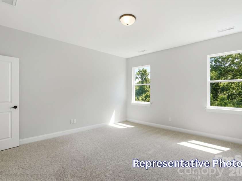 128 Swing Way, Troutman, NC 28166.  MLS# CAR4391618, YatesRealty ID 40277. Primary Bedroom