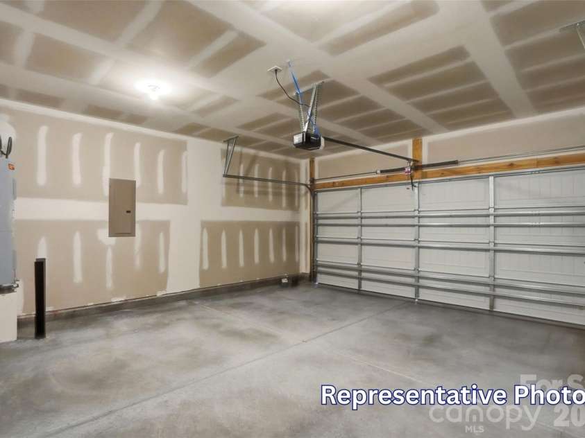 128 Swing Way, Troutman, NC 28166.  MLS# CAR4391618, YatesRealty ID 40277. Two Car garage