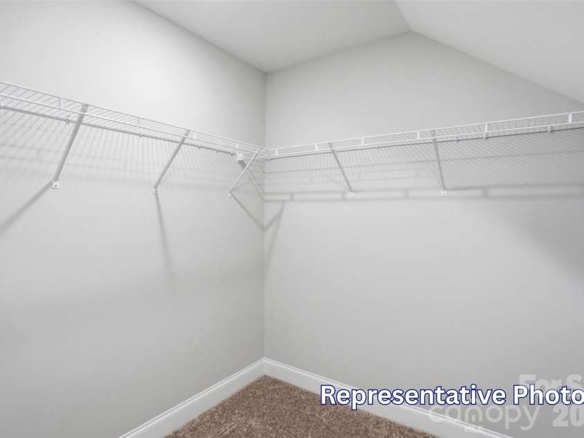 128 Swing Way, Troutman, NC 28166.  MLS# CAR4391618, YatesRealty ID 40277. Walk in Closet