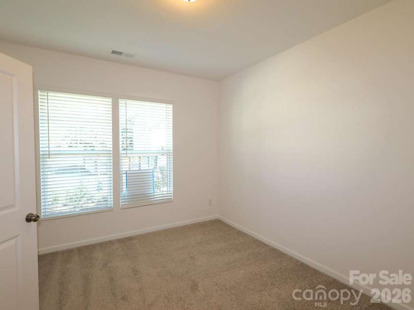641 Willoughby Park Drive, Monroe, NC 28112.  MLS# CAR4408928, YatesRealty ID 40290. First floor bedroom