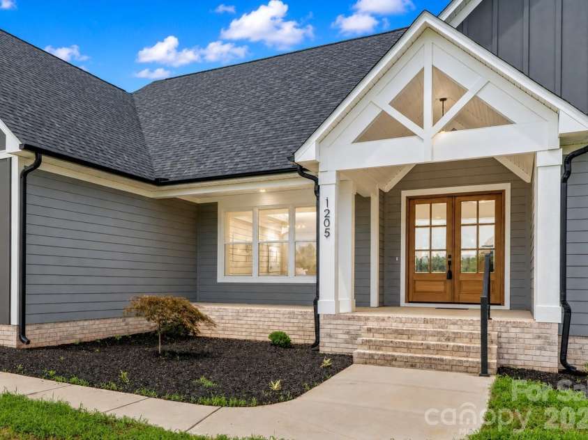 1205 Coppergate Drive, Salisbury, NC 28147.  MLS# CAR4406348, YatesRealty ID 40304. No cookie cutter home here. Front proch is spacious & covered.