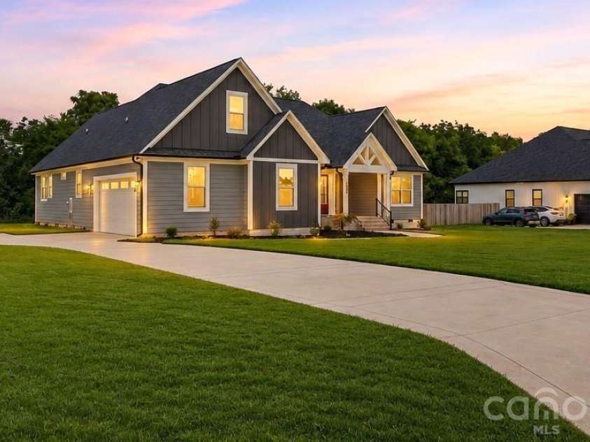 1205 Coppergate Drive, Salisbury, NC 28147.  MLS# CAR4406348, YatesRealty ID 40304. Shows how long the double driveway is.