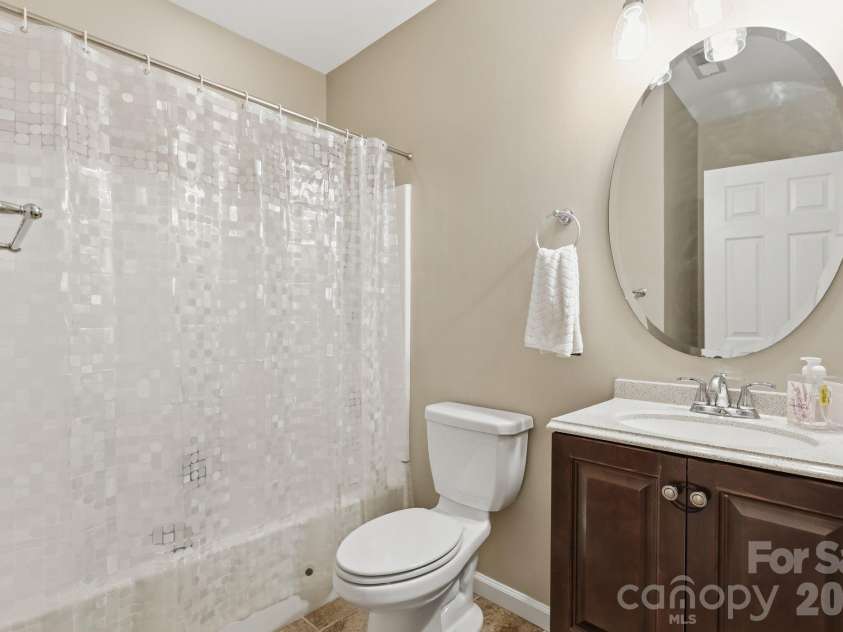 5098 Cressingham Drive, Fort Mill, SC 29707.  MLS# CAR4408612, YatesRealty ID 40307. Downstairs bathroom