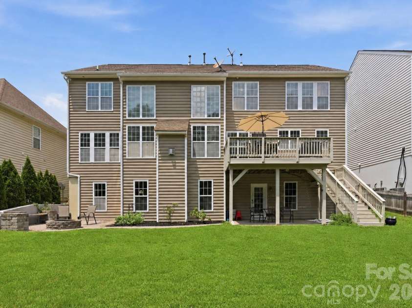 5098 Cressingham Drive, Fort Mill, SC 29707.  MLS# CAR4408612, YatesRealty ID 40307. Grass is virtually altered.