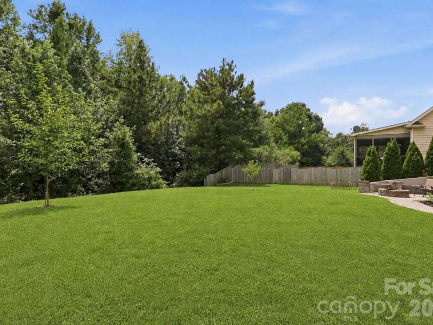 5098 Cressingham Drive, Fort Mill, SC 29707.  MLS# CAR4408612, YatesRealty ID 40307. Grass is virtually altered.
