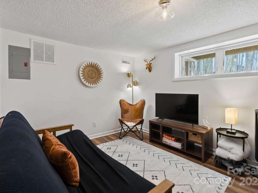 721 Pine Ridge Road, Beech Mountain, NC 28604.  MLS# CAR4242595, YatesRealty ID 4033. Bunk Room/Guest Bedroom #3 on Lower Level