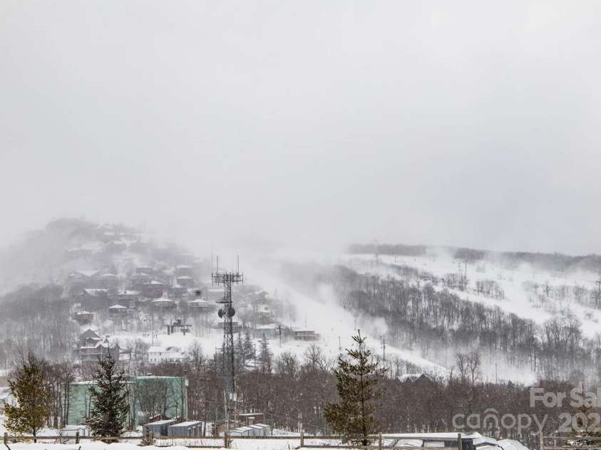 721 Pine Ridge Road, Beech Mountain, NC 28604.  MLS# CAR4242595, YatesRealty ID 4033. Ski Slopes - Winter View