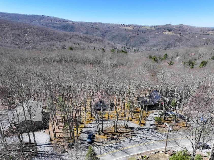 721 Pine Ridge Road, Beech Mountain, NC 28604.  MLS# CAR4242595, YatesRealty ID 4033. Street View - Plenty of Flat Parking