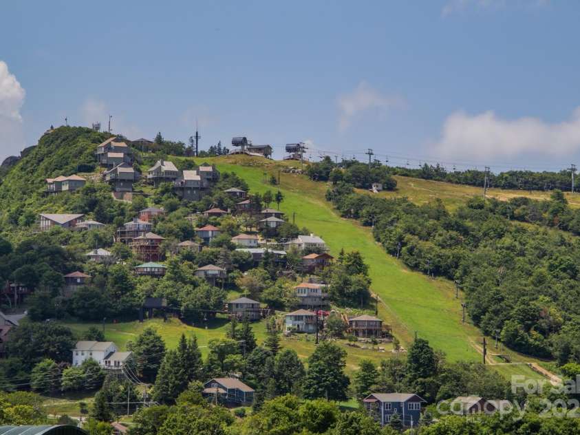 721 Pine Ridge Road, Beech Mountain, NC 28604.  MLS# CAR4242595, YatesRealty ID 4033. Summer Ski Slopes - Bring your mountain bike!