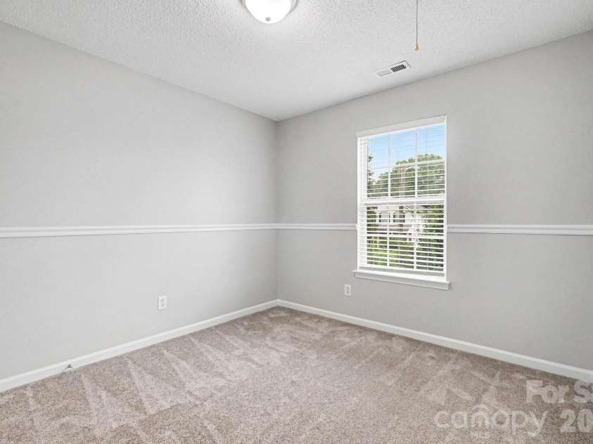 2994 Champion Lane, Concord, NC 28025.  MLS# CAR4408234, YatesRealty ID 40333. 