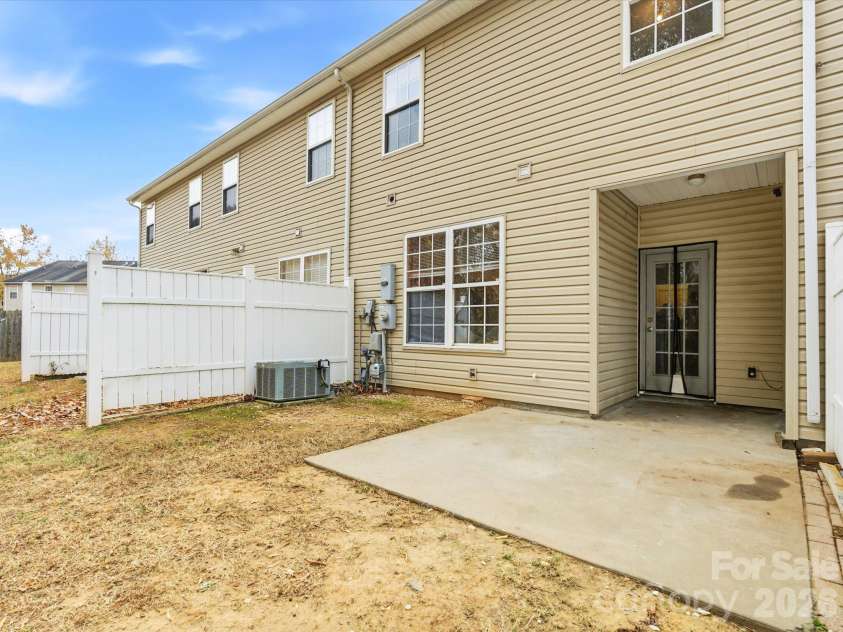 7715 Abigail Glen Drive, Charlotte, NC 28212.  MLS# CAR4324481, YatesRealty ID 4034. Covered patio area 