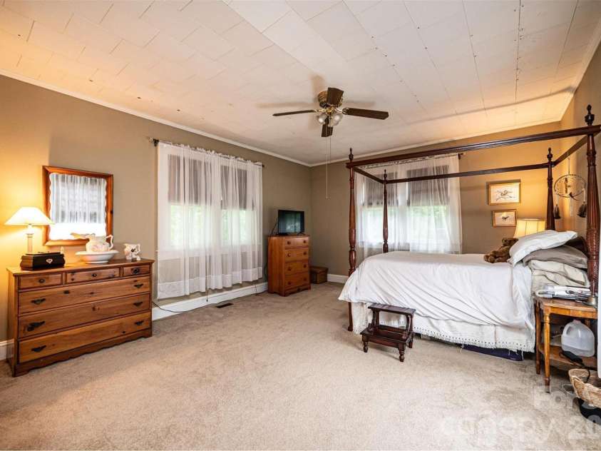 720 Main Avenue, Newton, NC 28658.  MLS# CAR4400536, YatesRealty ID 40342. Primary bedroom with en suite bath