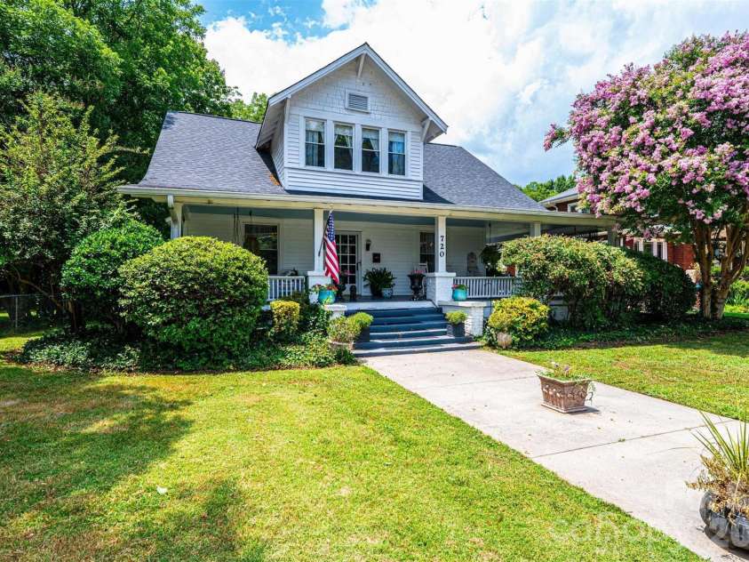720 Main Avenue, Newton, NC 28658.  MLS# CAR4400536, YatesRealty ID 40342. Spacious yard and wrap around porch
