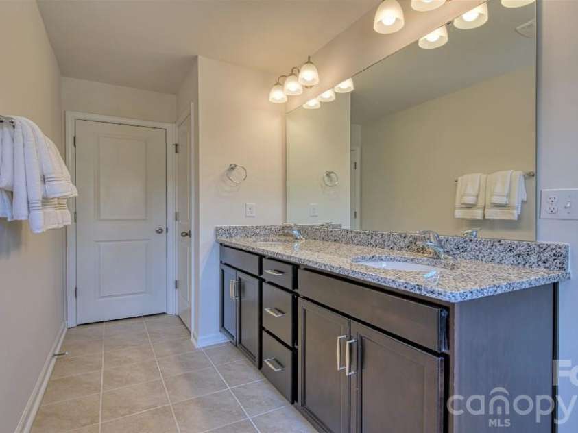 50 Creekview Road, Hendersonville, NC 28792.  MLS# CAR4402674, YatesRealty ID 40352. Photos are representative