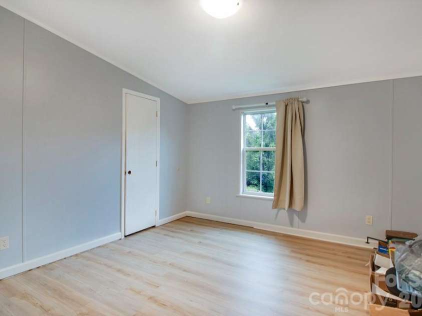 1474 Pea Ridge Road, Mill Spring, NC 28756.  MLS# CAR4407178, YatesRealty ID 40359. Guest Bedroom 1