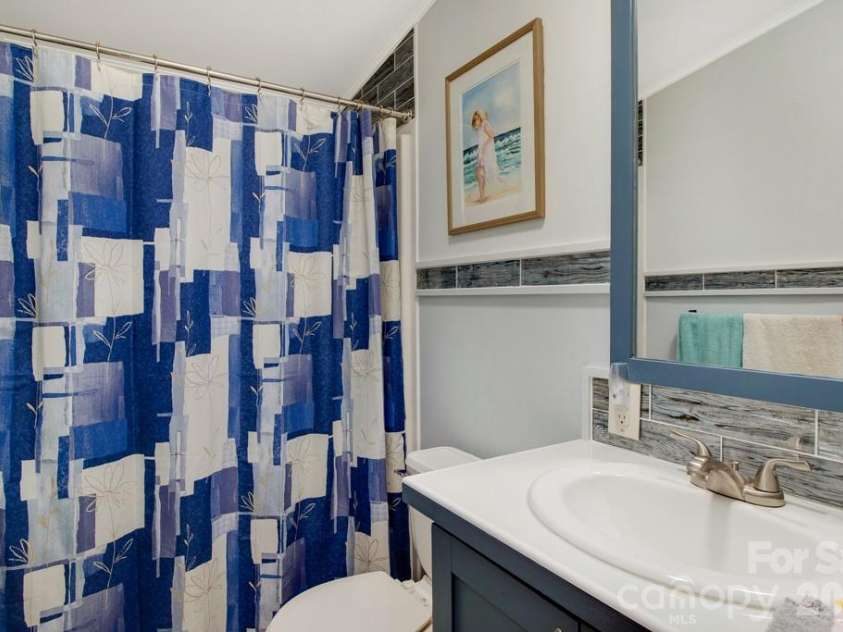 1474 Pea Ridge Road, Mill Spring, NC 28756.  MLS# CAR4407178, YatesRealty ID 40359. Guest Full Bath