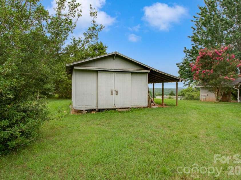 1474 Pea Ridge Road, Mill Spring, NC 28756.  MLS# CAR4407178, YatesRealty ID 40359. Large Shed