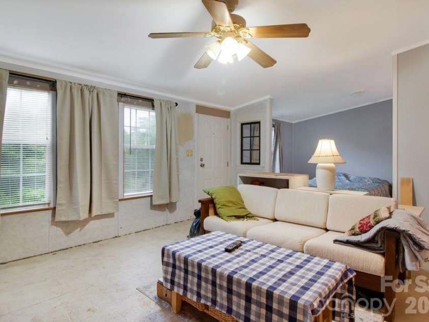 1474 Pea Ridge Road, Mill Spring, NC 28756.  MLS# CAR4407178, YatesRealty ID 40359. Living Room