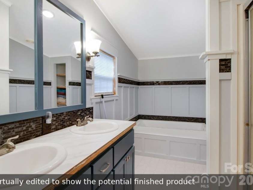 1474 Pea Ridge Road, Mill Spring, NC 28756.  MLS# CAR4407178, YatesRealty ID 40359. Primary Bathroom. Virtually edited to show the potential finished product.