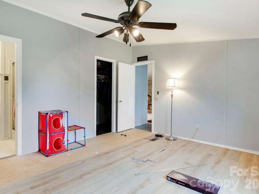 1474 Pea Ridge Road, Mill Spring, NC 28756.  MLS# CAR4407178, YatesRealty ID 40359. Primary Bedroom
