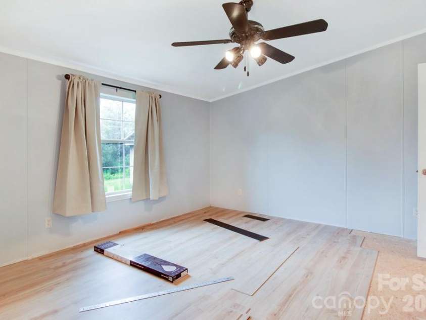 1474 Pea Ridge Road, Mill Spring, NC 28756.  MLS# CAR4407178, YatesRealty ID 40359. Primary Bedroom