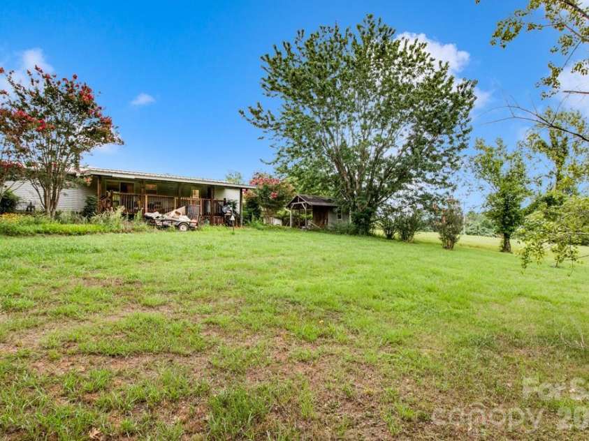 1474 Pea Ridge Road, Mill Spring, NC 28756.  MLS# CAR4407178, YatesRealty ID 40359. Private back yard