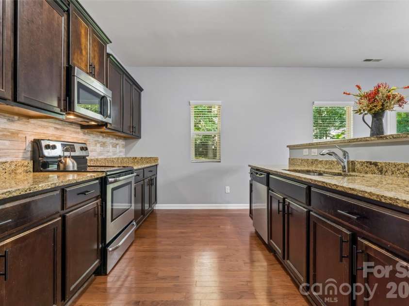 8402 Bampton Drive, Concord, NC 28027.  MLS# CAR4408985, YatesRealty ID 40366. 