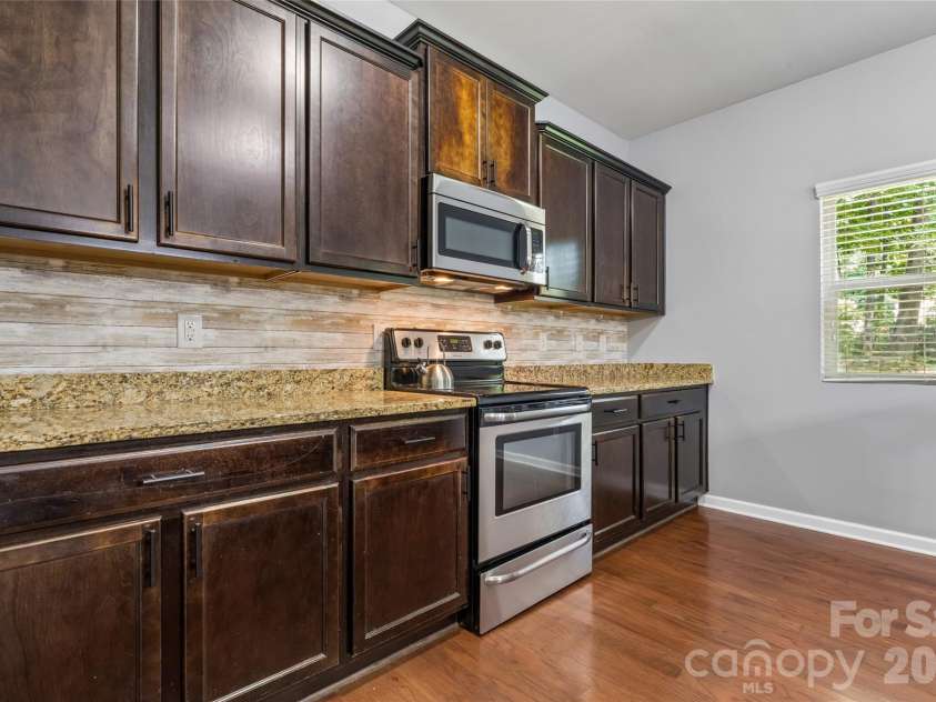 8402 Bampton Drive, Concord, NC 28027.  MLS# CAR4408985, YatesRealty ID 40366. 