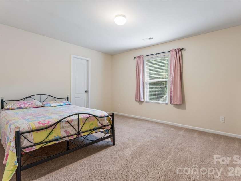 8402 Bampton Drive, Concord, NC 28027.  MLS# CAR4408985, YatesRealty ID 40366. 