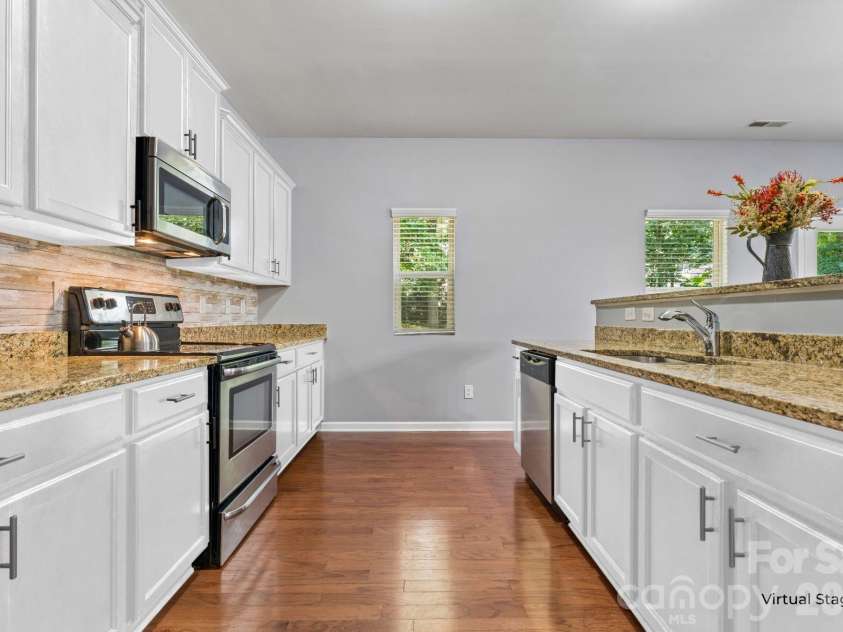 8402 Bampton Drive, Concord, NC 28027.  MLS# CAR4408985, YatesRealty ID 40366. 