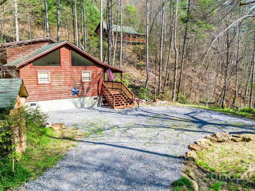 215 Honeysuckle Lane, Sylva, NC 28779.  MLS# CAR4243032, YatesRealty ID 4037. 