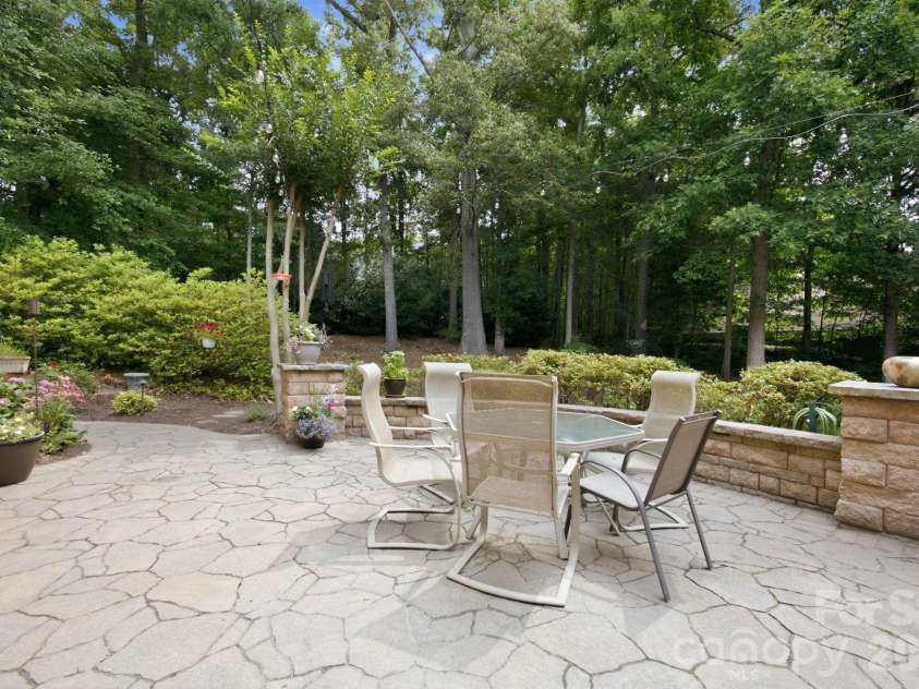 1016 Firethorne Club Drive, Waxhaw, NC 28173.  MLS# CAR4393647, YatesRealty ID 40370. Private Back Patio