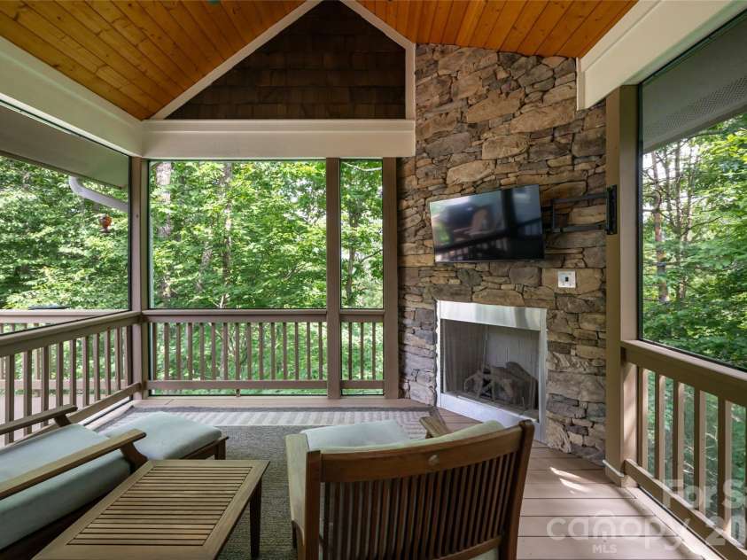 8 Sugarland Ridge Road, Fairview, NC 28730.  MLS# CAR4396136, YatesRealty ID 40393. Back Porch