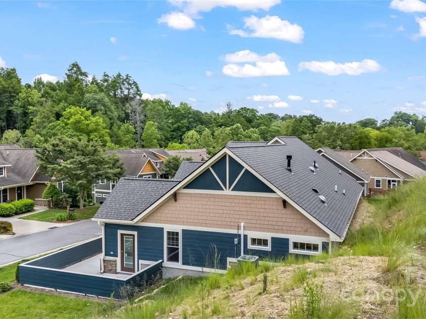 48 Creekside View Drive, Asheville, NC 28804.  MLS# CAR4046496, YatesRealty ID 4040. Unique home design as there is no backyard to maintain!