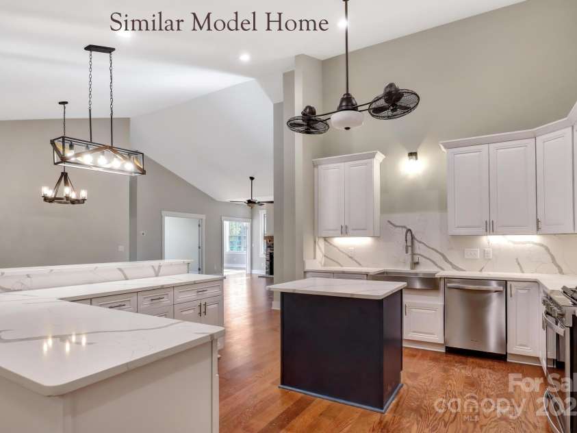 24-#S-4 Brookstone Place, Candler, NC 28715.  MLS# CAR4289931, YatesRealty ID 4041. Spacious kitchen with direct dining access