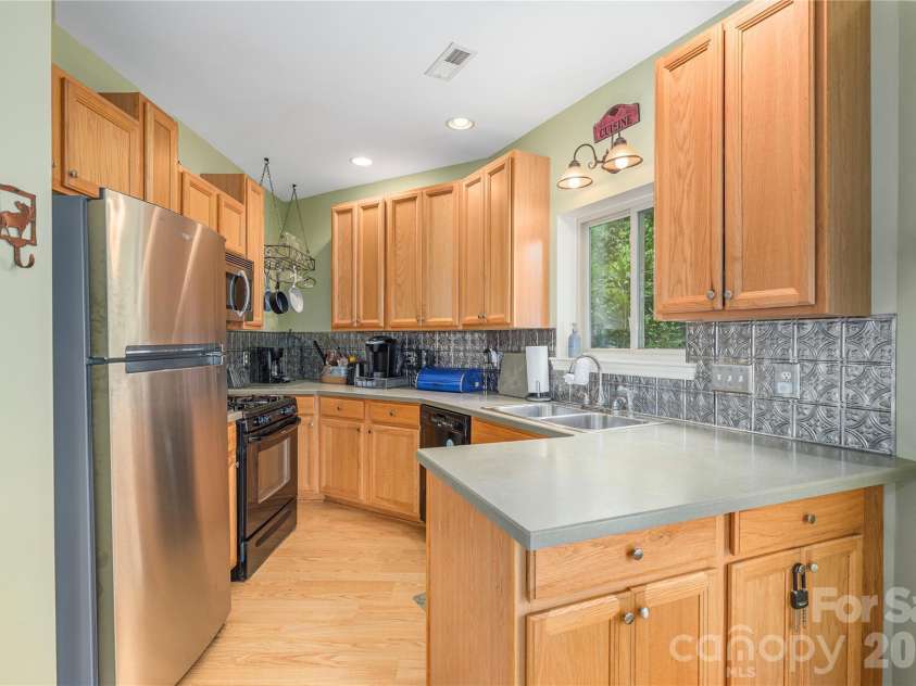 309 Irene Lane, Maggie Valley, NC 28751.  MLS# CAR4381461, YatesRealty ID 40412. Updated Kitchen with Plenty of Storage