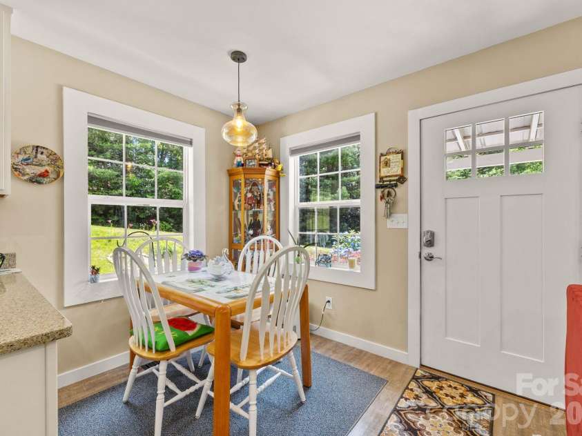 54 Thad Johnson Road, Saluda, NC 28773.  MLS# CAR4396758, YatesRealty ID 40414. Dining -