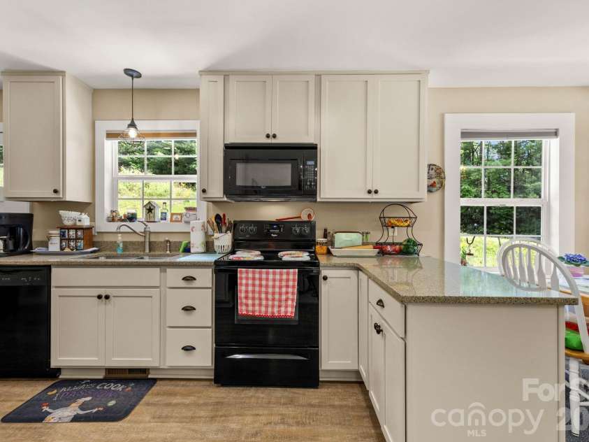 54 Thad Johnson Road, Saluda, NC 28773.  MLS# CAR4396758, YatesRealty ID 40414. Kitchen -