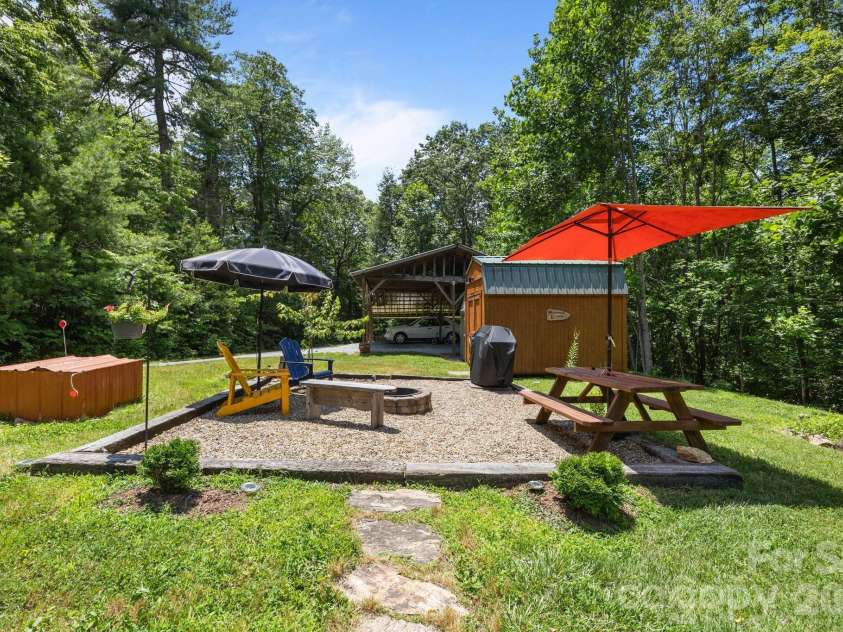 54 Thad Johnson Road, Saluda, NC 28773.  MLS# CAR4396758, YatesRealty ID 40414. Lovely Firepit to enjoy -