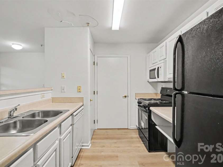 9849 Campus Walk Lane, Charlotte, NC 28262.  MLS# CAR4408053, YatesRealty ID 40418. 