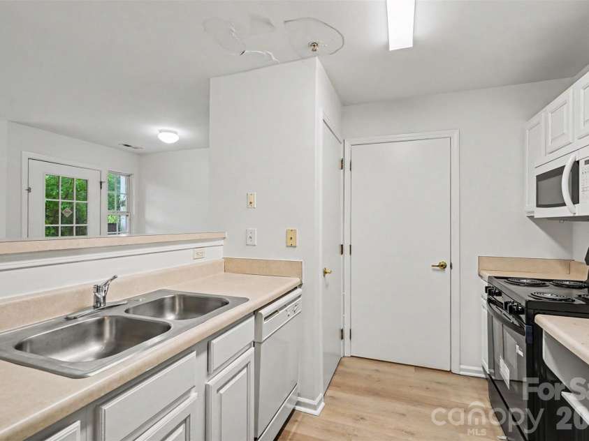 9849 Campus Walk Lane, Charlotte, NC 28262.  MLS# CAR4408053, YatesRealty ID 40418. 