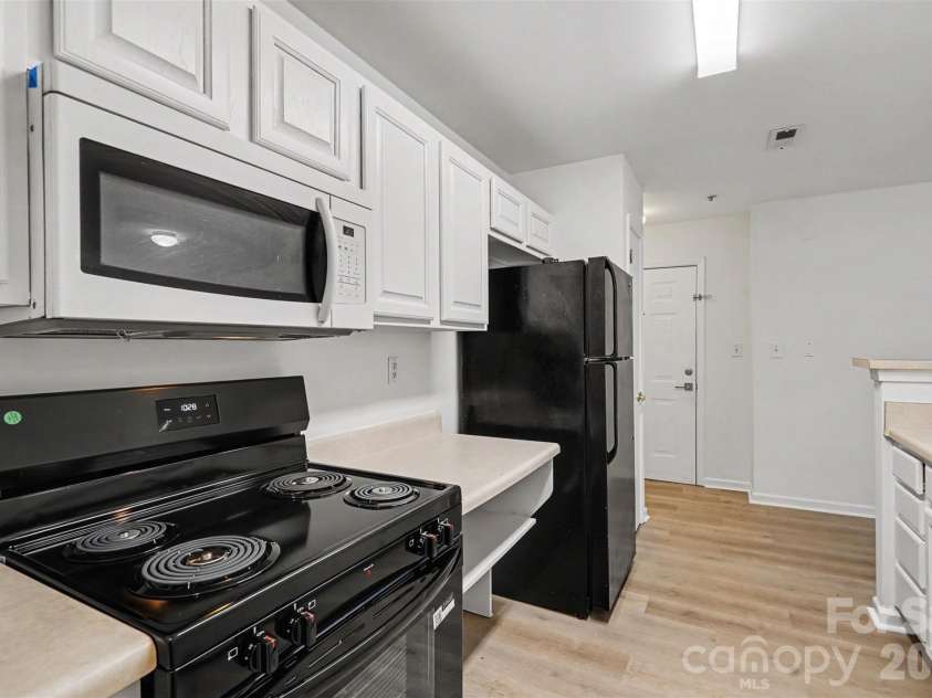 9849 Campus Walk Lane, Charlotte, NC 28262.  MLS# CAR4408053, YatesRealty ID 40418. 