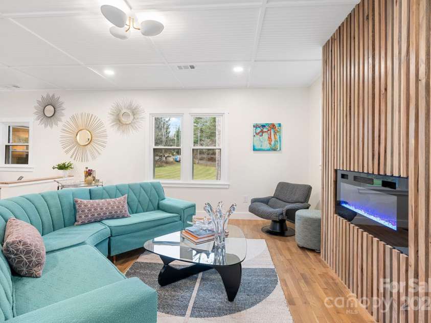 241 Pole Creasman Road, Asheville, NC 28806.  MLS# CAR4199603, YatesRealty ID 4043. Family room Fireplace