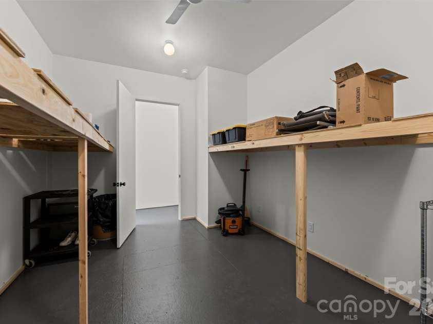109 Pintail Place, Whittier, NC 28789.  MLS# CAR4409072, YatesRealty ID 40434. Workshop closet