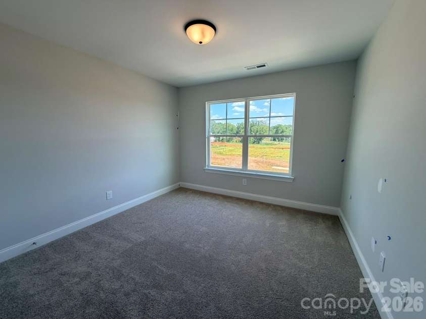 126 Pointer Trail, Troutman, NC 28166.  MLS# CAR4376584, YatesRealty ID 40435. Bedroom 3