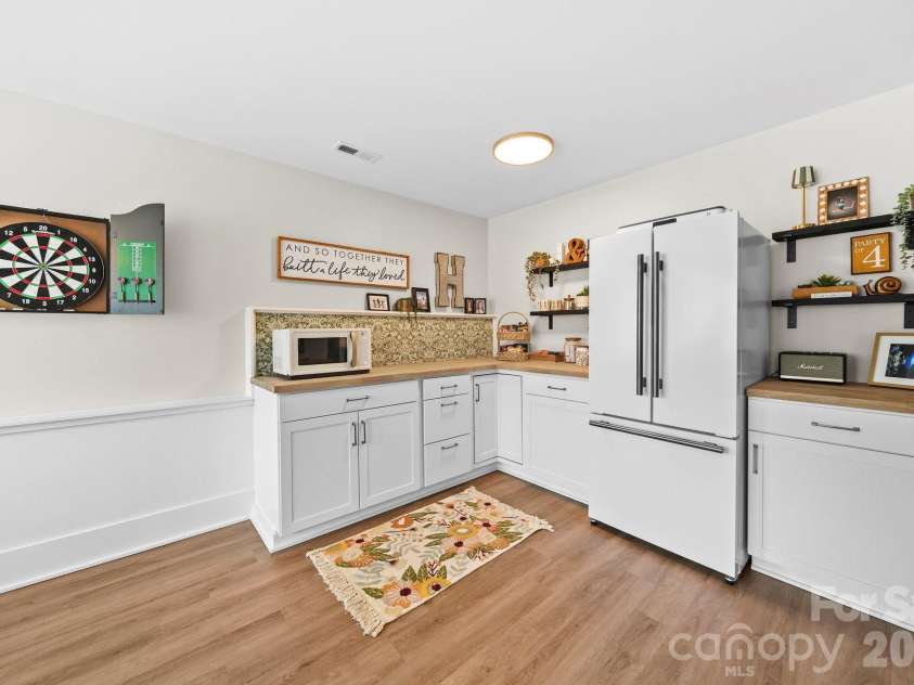 698 Lake Head Road, Norwood, NC 28128.  MLS# CAR4408589, YatesRealty ID 40436. Basement - Kitchenette