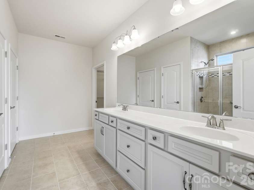 1620 Red Leaf Drive, Fort Mill, SC 29715.  MLS# CAR4402773, YatesRealty ID 40438. Primary bathroom