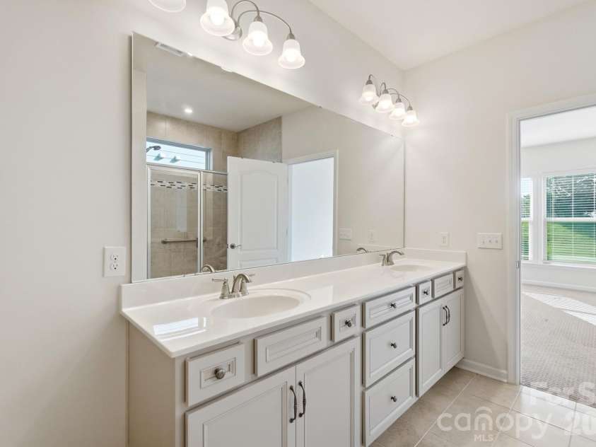 1620 Red Leaf Drive, Fort Mill, SC 29715.  MLS# CAR4402773, YatesRealty ID 40438. Primary bathroom