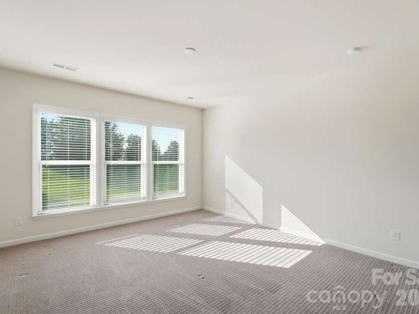 1620 Red Leaf Drive, Fort Mill, SC 29715.  MLS# CAR4402773, YatesRealty ID 40438. Primary bedroom